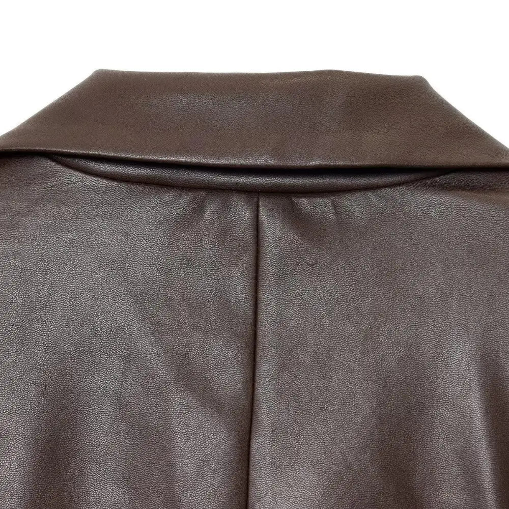 Women’s straight brown faux leather blazer with a structured collar and subtle textured finish