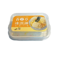 Clear plastic container holding a simulated ice cream cake slow rising fidget toy with an orange label and chinese characters