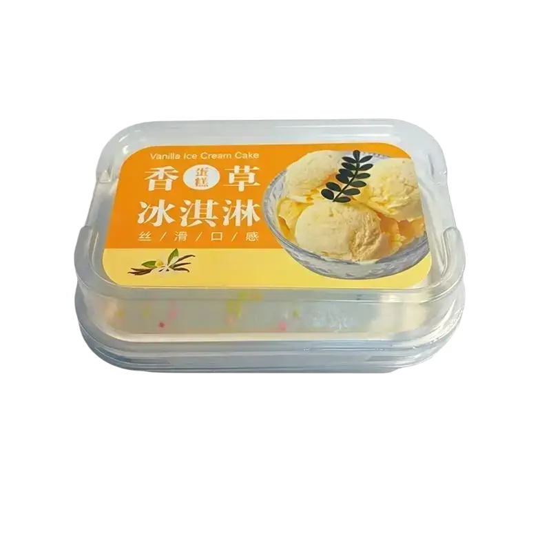 Clear plastic container holding a vanilla simulated ice cream cake with an orange label and chinese characters slow rising fidget toy