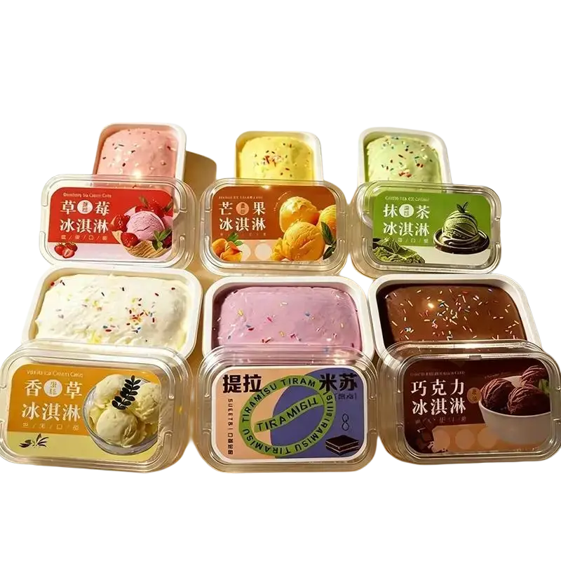 Six simulated ice cream cake slow rising fidget toys in rectangular plastic containers with colorful labels in various flavors