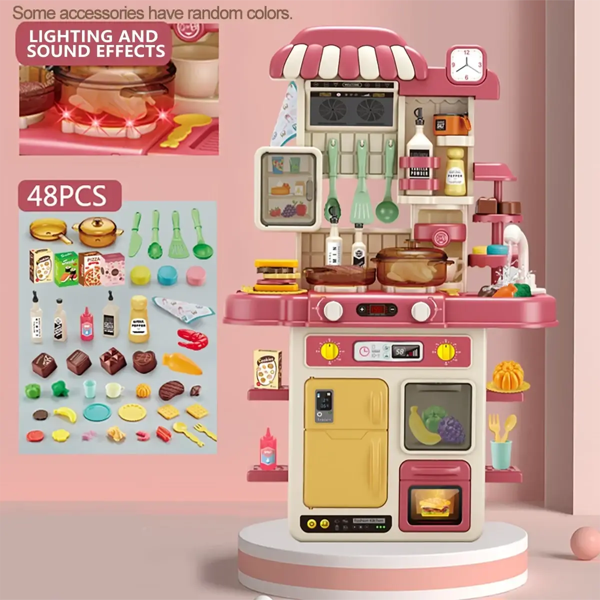 Simulated kitchen playset in pink and beige plastic with 48 accessory pieces featuring lights and steam effects