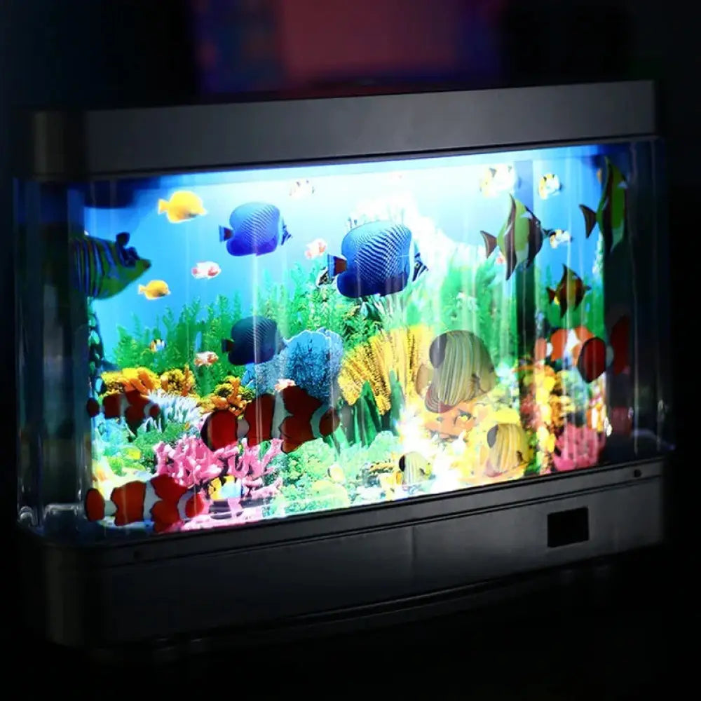 Led tropical fish aquarium motion night light with colorful plastic fish and coral reef decoration inside glowing led tank