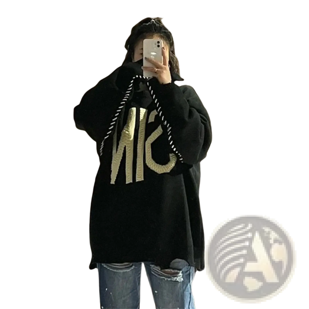 Black oversized knit sweater featuring bold gold embroidered sin lettering on the front
