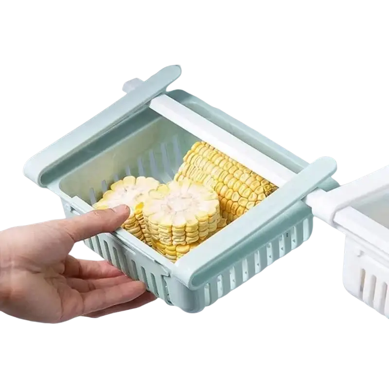 Light blue plastic sink drain rack with slatted sides and hinged lid made of food-grade polypropylene holding frozen corn cobs