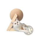 Beige sisal cat scratching ball mounted on a light wood triangular stand for feline claw care and play