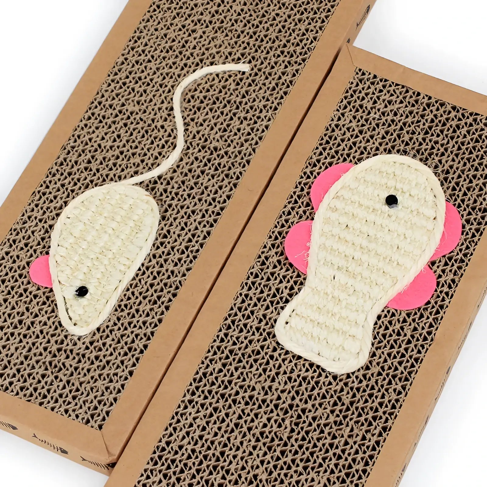 Two beige woven mouse-shaped sisal cat scratchers with pink ears and black eyes on brown cardboard surface