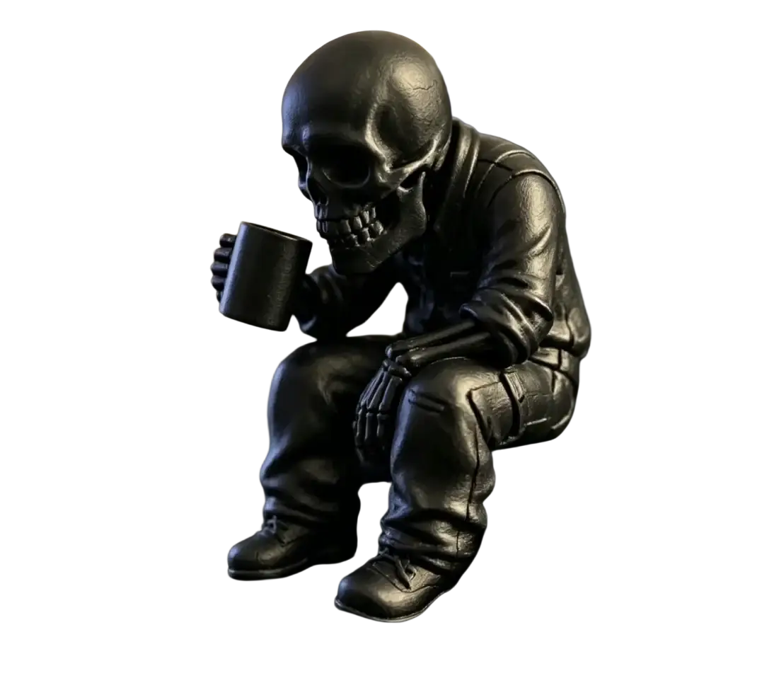 Black skull skeleton coffee desk figurine wearing leather jacket and pants holding a mug for office decor