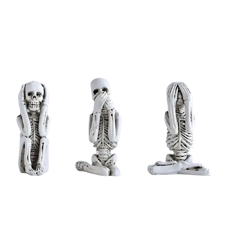Set of three white resin skeleton decoration figurines in distinct poses for tabletop mounting inspired by art deco style