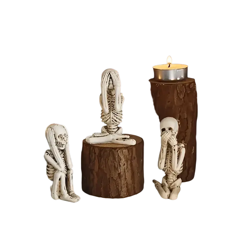 White resin three wise skeletons set featuring art deco skeleton decoration in various poses for tabletop mounting