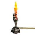 A gray skeletal hand candle holder gripping an orange led candle with black crackle and glowing flame for happy halloween party
