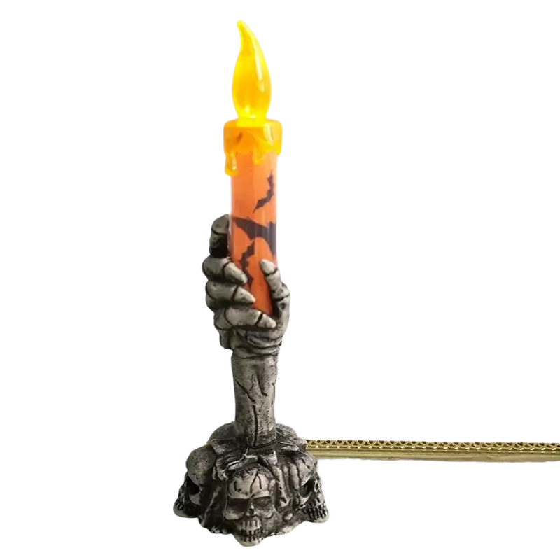 Skeleton hand led candle featuring a gray textured skeletal grip holding an orange cracked candle for happy halloween party