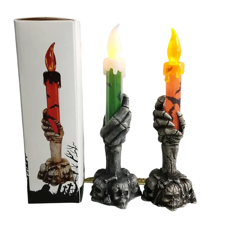 Skeleton hand led candle holders with skull bases and red green orange glowing flames for happy halloween party