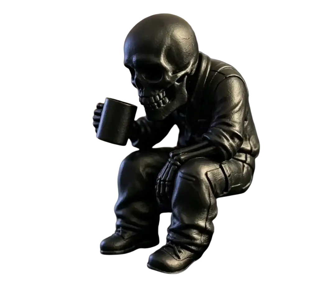 Black skeleton office worker coffee figurine in leather jacket and pants sitting holding a mug