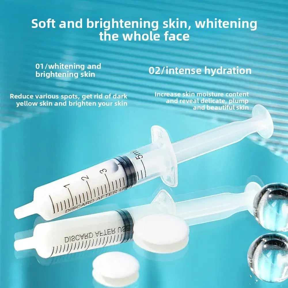 Clear plastic skin brightening face serum syringes with black markings white caps labeled discard after use on barrel
