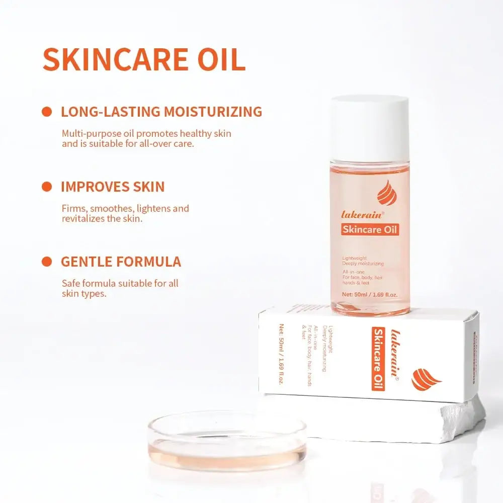 A clear glass bottle of lakerain skin care oil with moisturizing features containing light pink liquid and orange flame logo