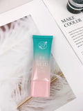 A gradient teal-to-pink squeeze tube of b b in a hyaluronic acid hydrating skincare gift set for glowing skin