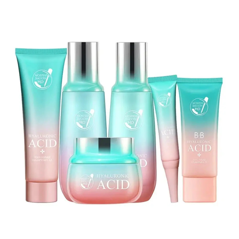 Hyaluronic acid hydrating skincare gift set with gradient teal to pink translucent bottles and metallic caps for glowing skin