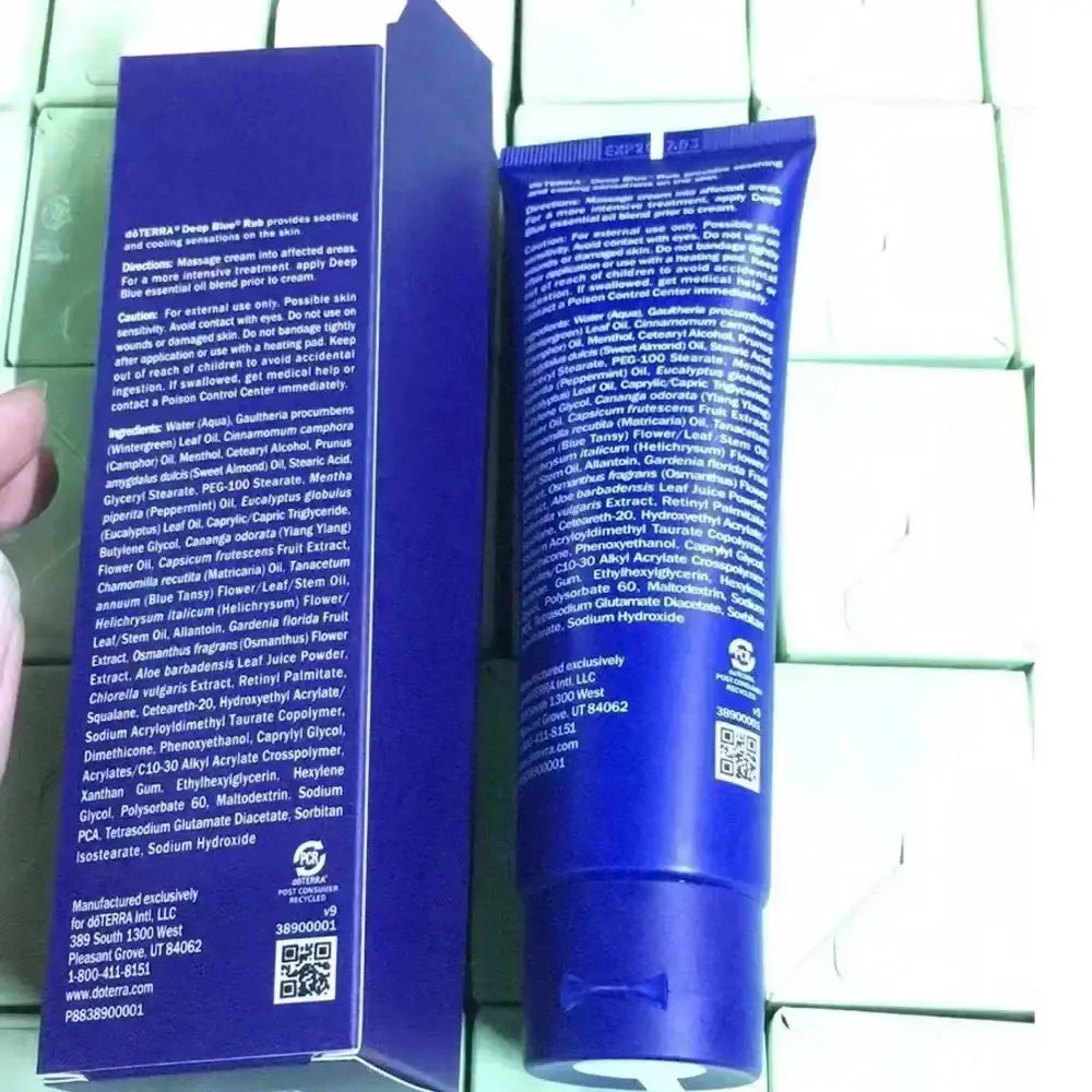 Blue plastic tube of doterra deep blue rub with white label and qr code skin care soothing balm 120ml moisturizing cream