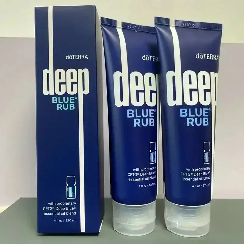 Two navy blue doterra deep blue rub tubes and matching box for skin care soothing balm 120ml moisturizing cream