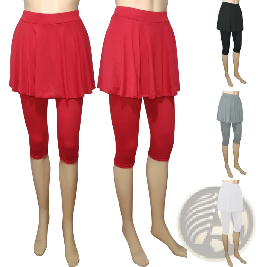 Red pleated skirt skort layered over black capri leggings activewear pants for athletic use