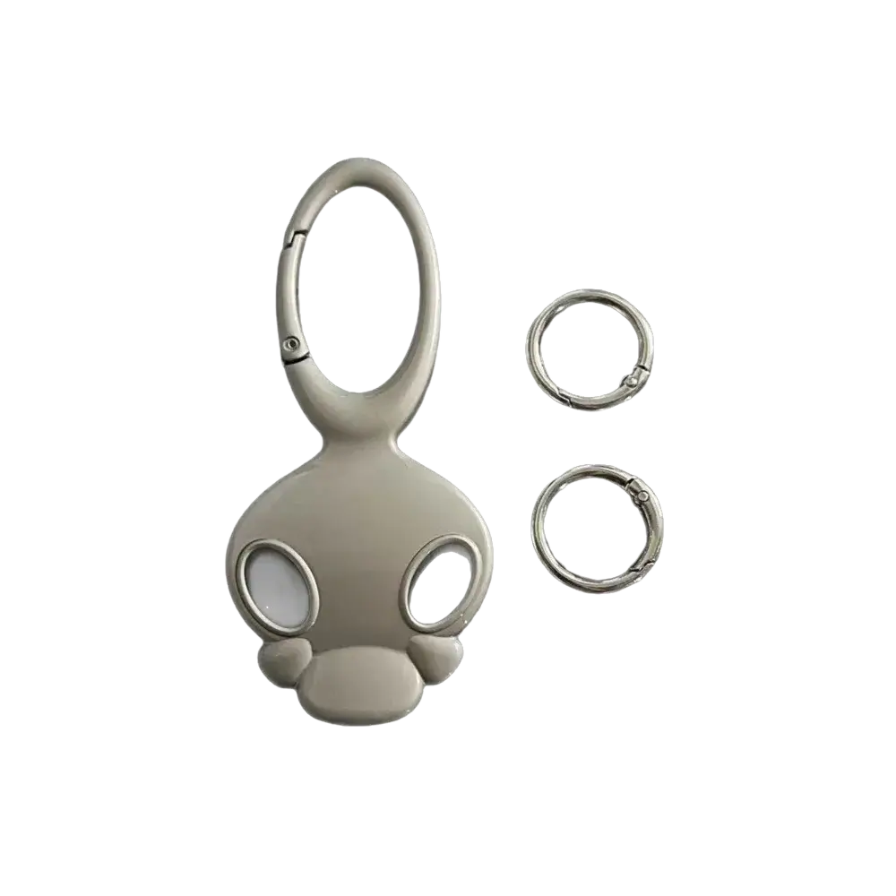 Gray skull metal car keychain bag charm with metallic silver carabiner and two matching rings for keys or bags