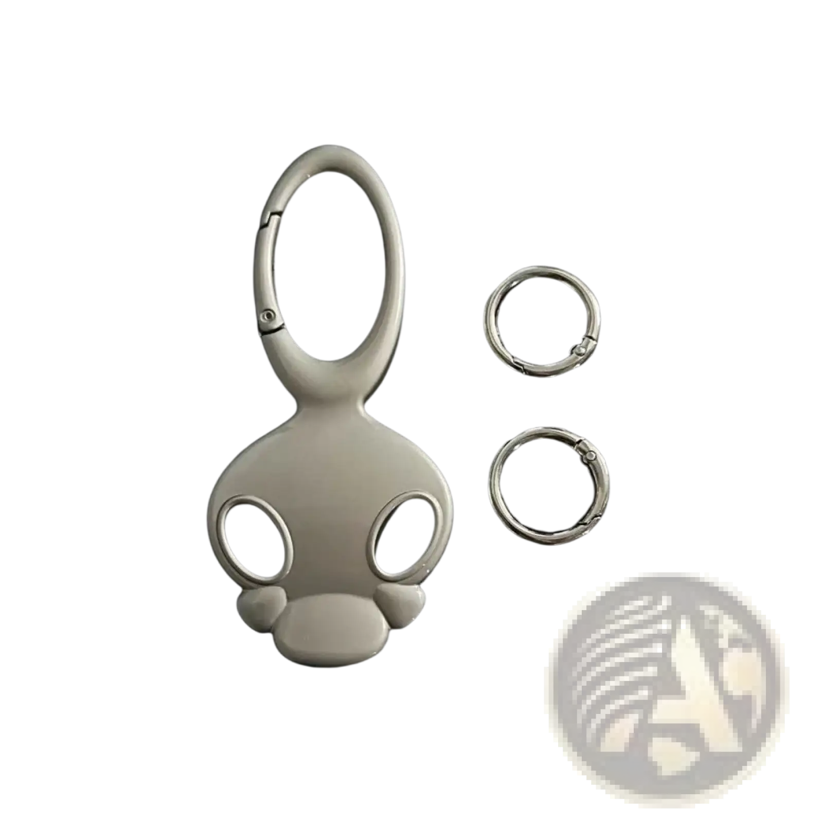 Silver metal skull keychain bag charm shaped like a monkey with a carabiner clip and two small rings