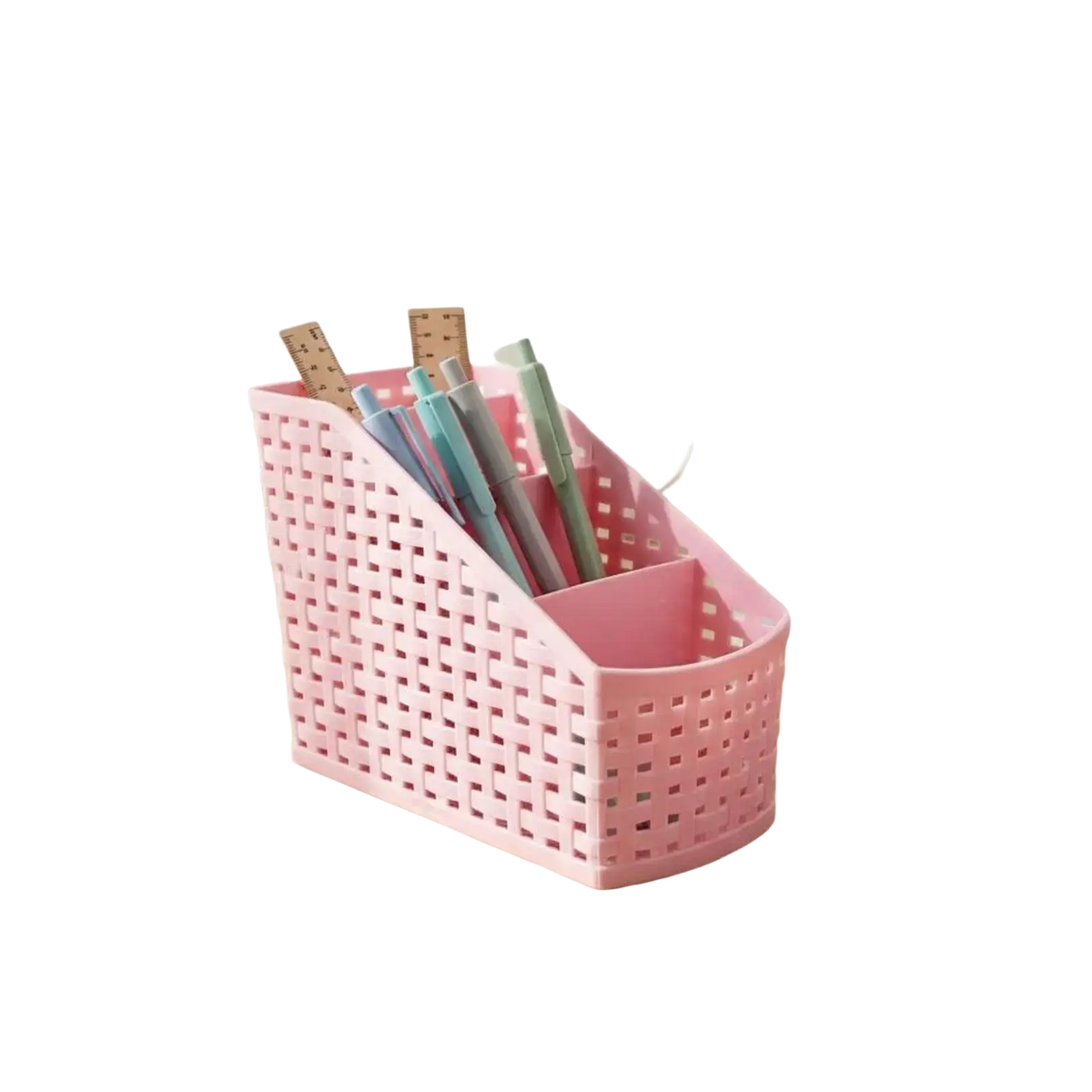 Slanted woven plastic desk organizer in pink with a lattice design and multiple compartments for pens and supplies