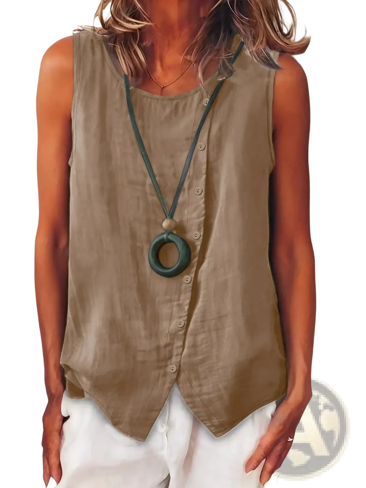 Dark green circular pendant necklace with matte finish and subtle texture on a sleeveless button down boho tank top