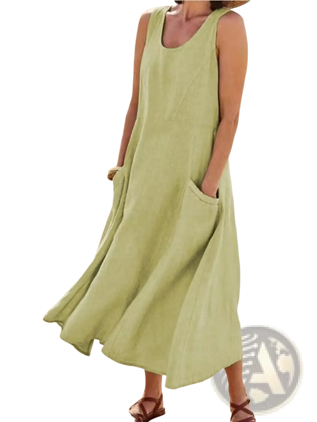 A flowing light green sleeveless linen a-line maxi dress with a relaxed fit and large front pockets