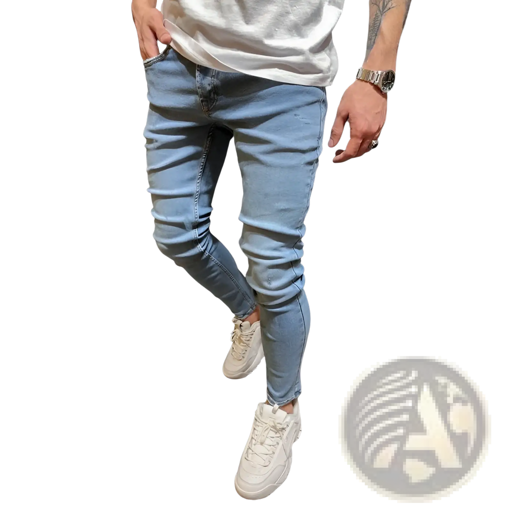 Slim fit light wash distressed denim jeans featuring a slim-fit cut and subtle fading details in denim material