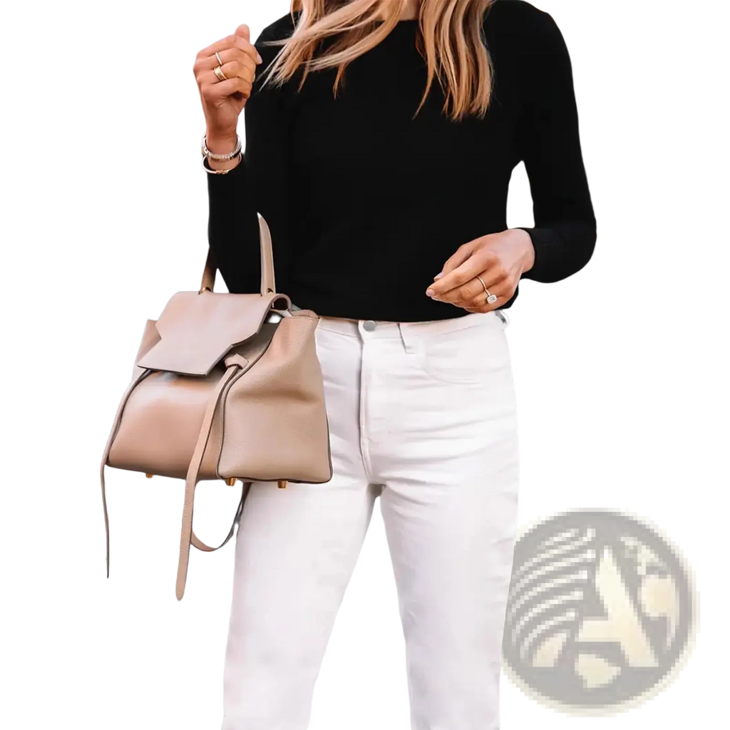Beige leather backpack with flap closure and adjustable shoulder straps shown from the back for slim fit straight trousers