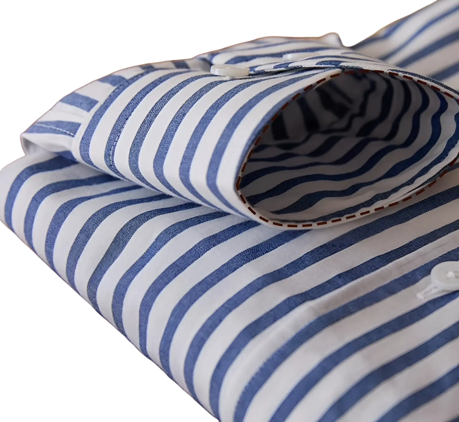 A neatly folded slim fit striped cotton long sleeve commuter shirt in blue and white with a classic design