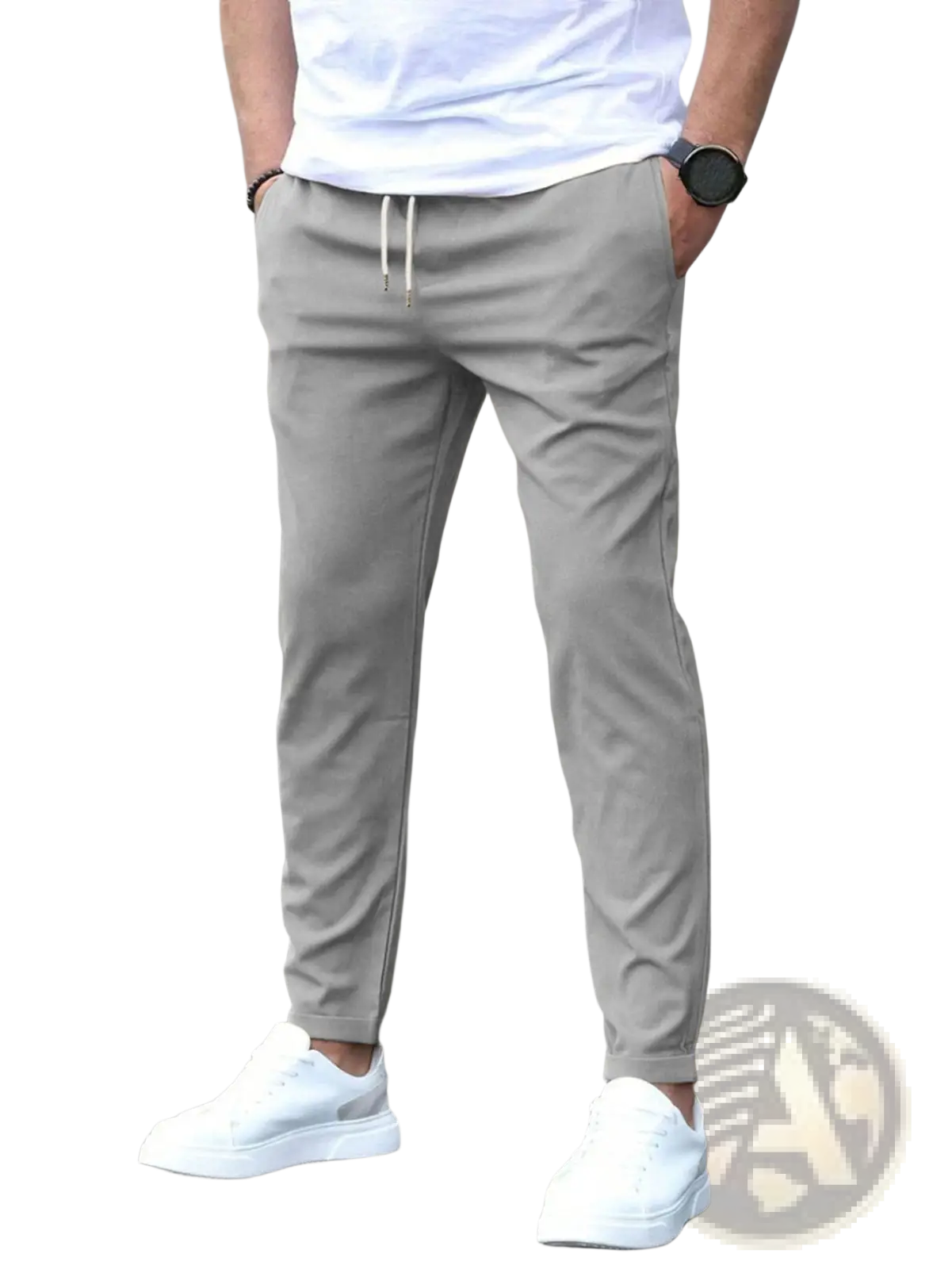 Gray slim fit tapered jogger pants with drawstring and tapered legs made from soft fabric for casual wear