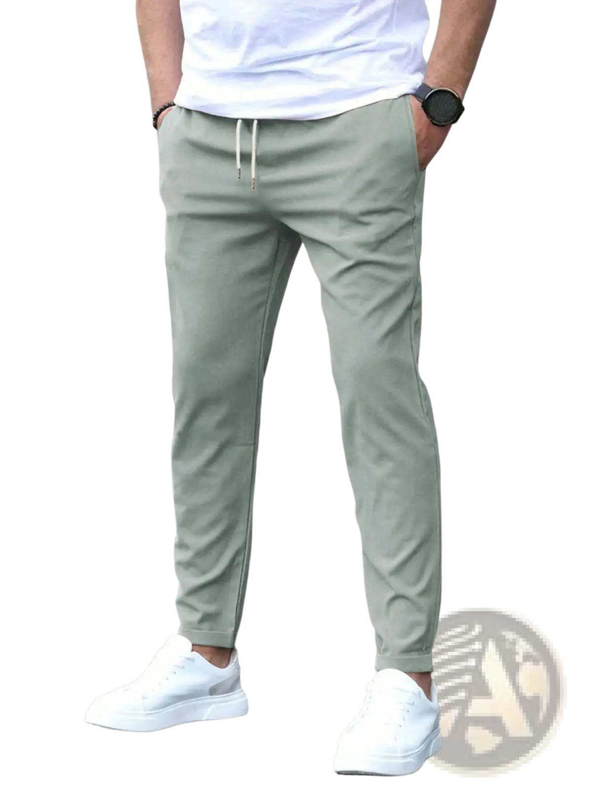 Light green slim fit tapered jogger pants with white drawstrings designed for casual and athletic wear