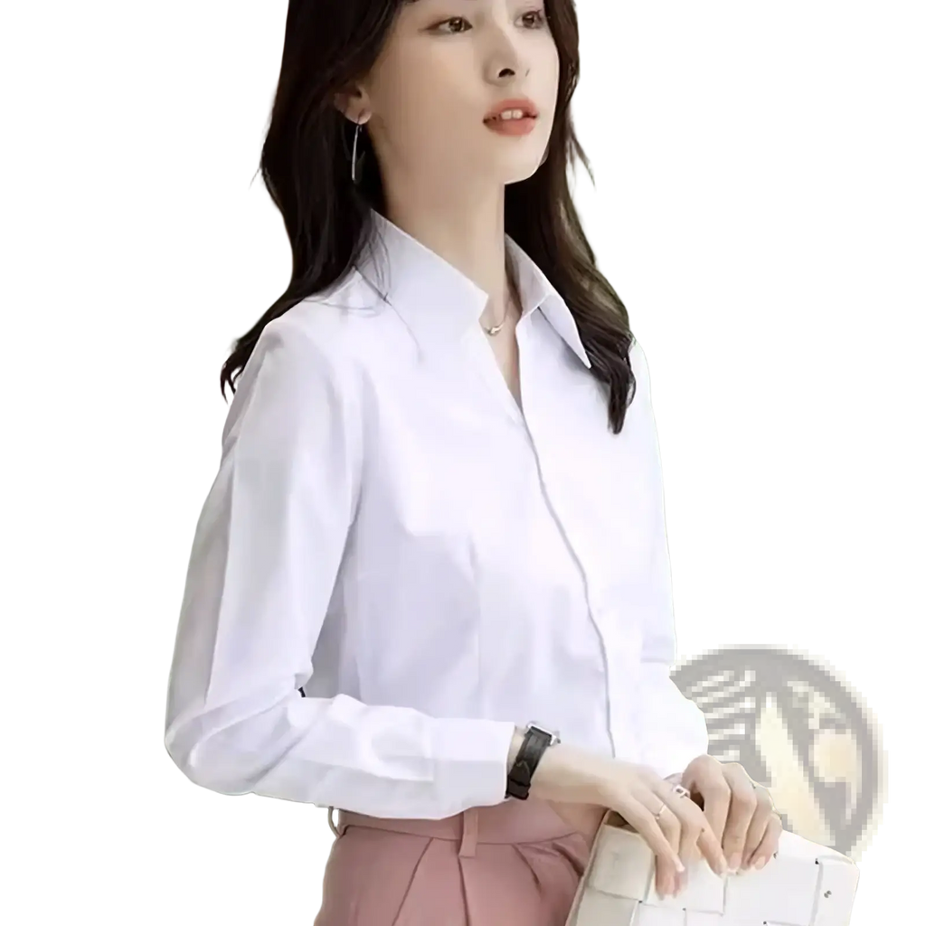 Slim fit white office blouse for women with long sleeves, crisp collar, and subtle pleats at the cuffs