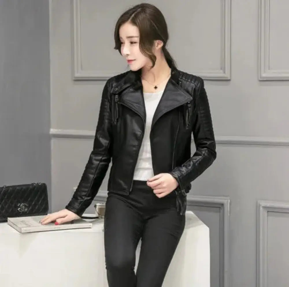 Women’s slim fit quilted black faux leather motorcycle jacket with zipper details and sleek fitted design