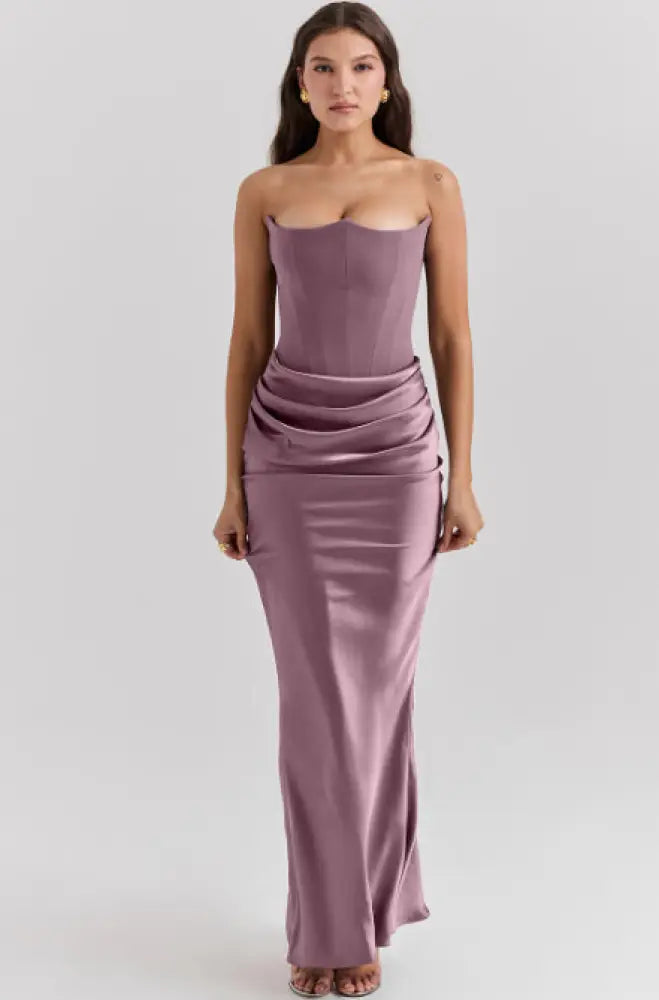 Satin strapless backless mermaid evening gown in lavender with a cinched waist and draped satin detailing