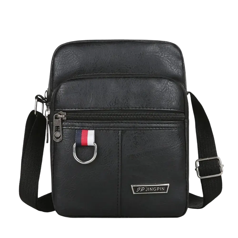 Black leather sling bag messenger with silver zipper pull and red white blue striped tab for casual use