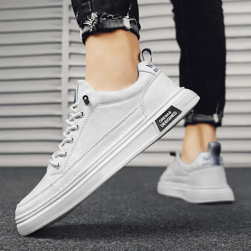Men’s casual suede and leather slip-on sneakers in white canvas with thick textured rubber sole and black laces
