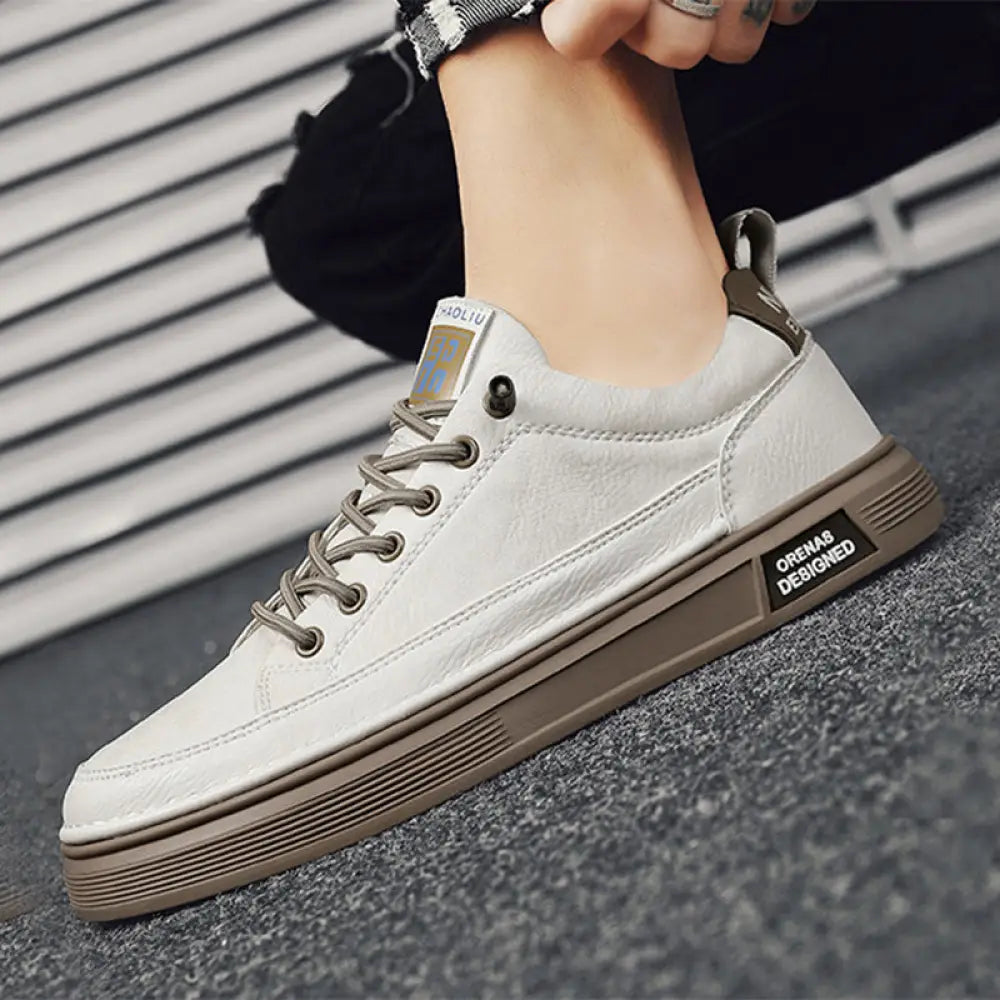 Men’s casual suede and leather slip-on sneaker in white leather with tan rubber sole and gray laces