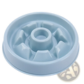 Light blue plastic slow feeder dog bowl with central hole and raised angular compartments for anti choke feeding