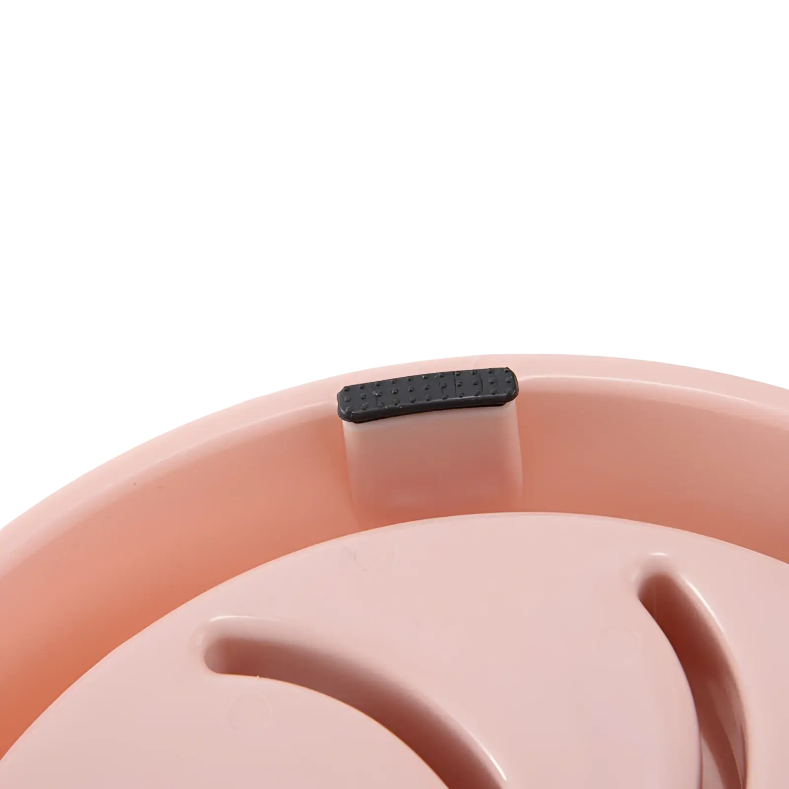 Pink plastic slow feeder dog bowl with black rubber grip rim designed as an anti choke pet dish