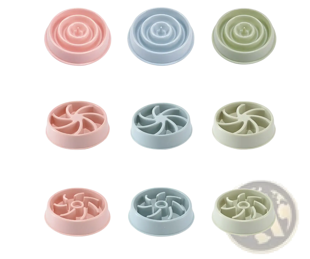 Set of three pastel silicone slow feeder dog bowls in pink blue and green with spiral and fan-shaped anti choke designs