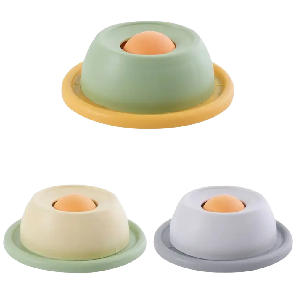 Pastel-colored silicone slow feeder pet lick bowl with stable base featuring an egg shape and a soft orange ball inside