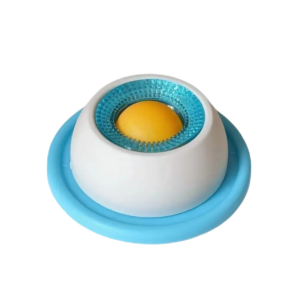 Slow feeder pet lick bowl with stable silicone base featuring blue textured ring and yellow ball center