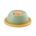 Pastel green and yellow plastic slow feeder pet lick bowl with stable base and central orange sphere