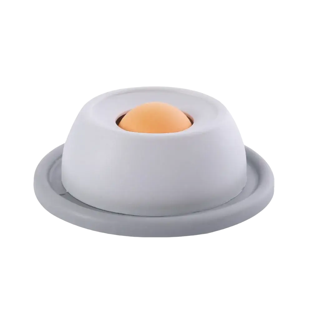 White plastic slow feeder pet lick bowl with stable base and light orange rounded center piece