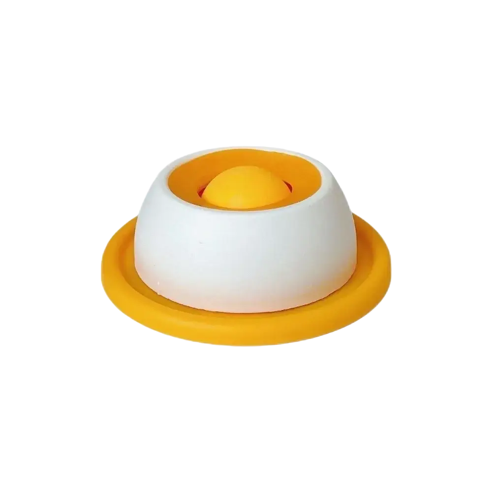 White and yellow silicone slow feeder pet lick bowl with a removable yolk center and stable base