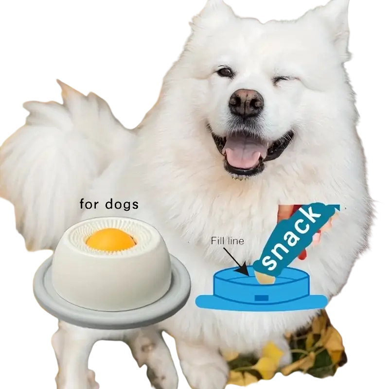 White ceramic slow feeder dog treat dispenser with gray base and visible orange treat inside for interactive feeding