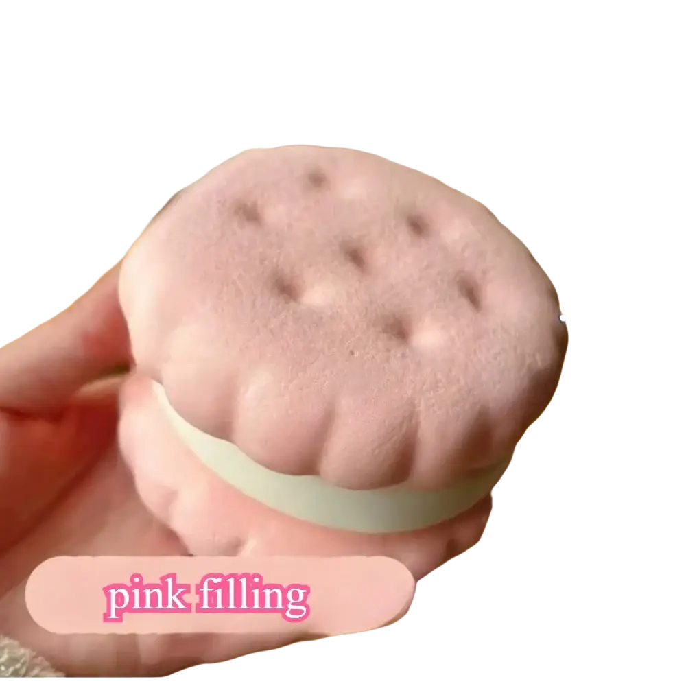 Pink strawberry-shaped slow rising big cookie squishy toy with white filling and textured realistic cake top
